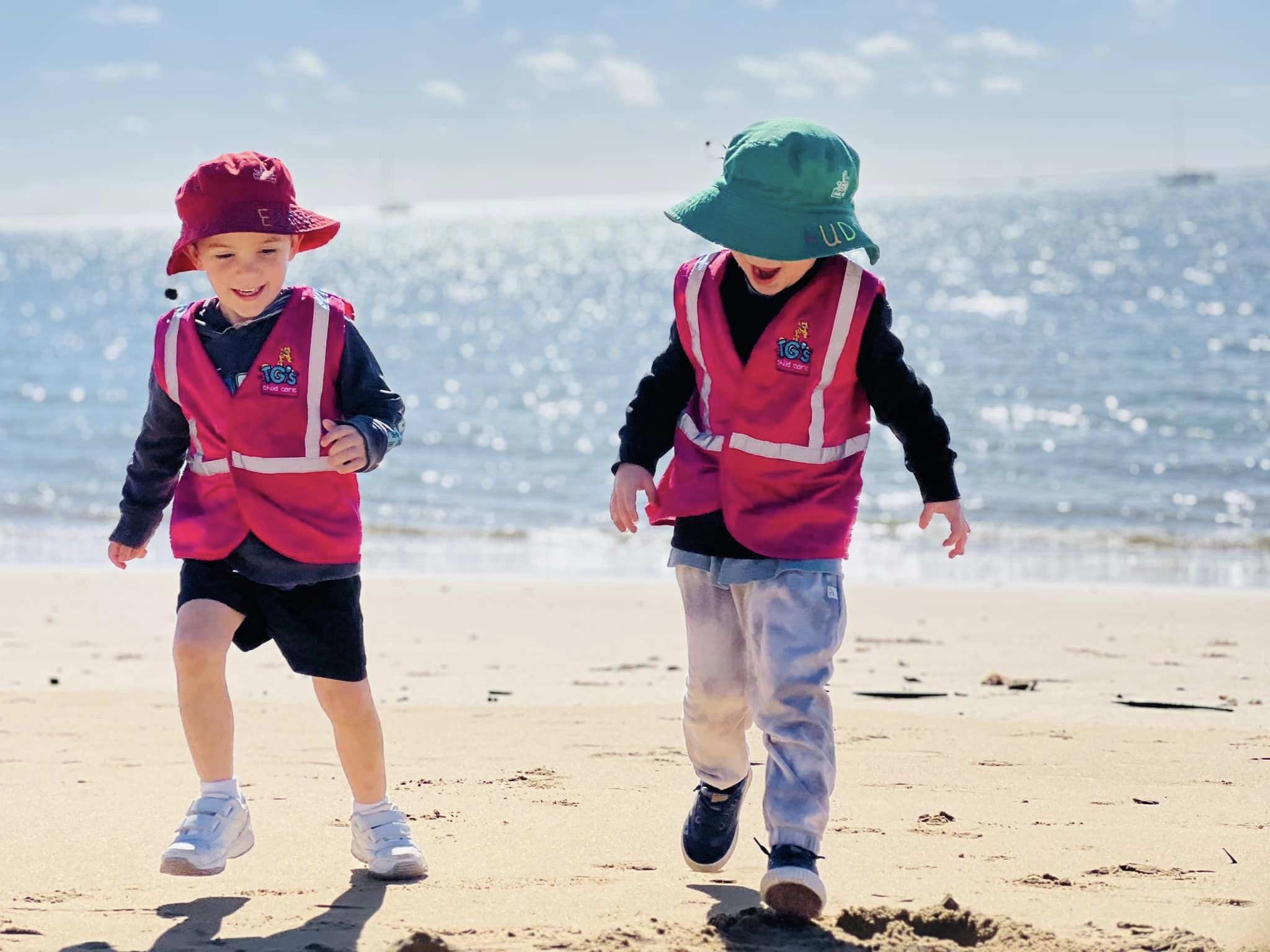 tgs urangan beach kindy ESG two children out at the beach