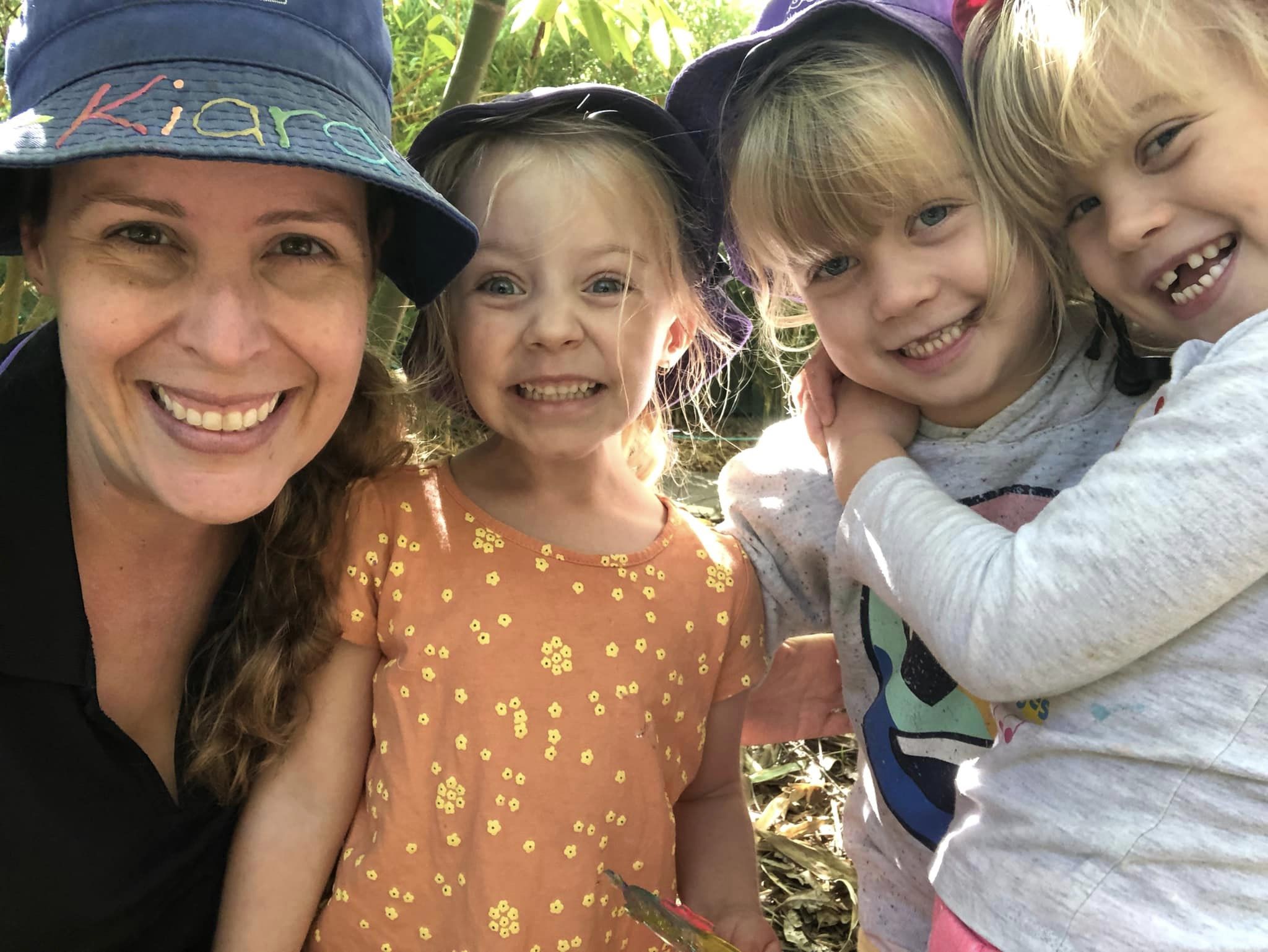 tg ́s riverbreeze educator smiling with children