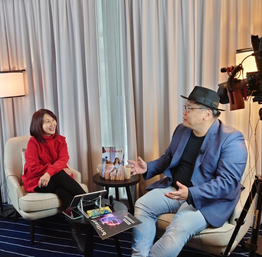 Veronica Lind Vermilion Pinstripes and Noel Ong Samso discussing collaborative efforts
